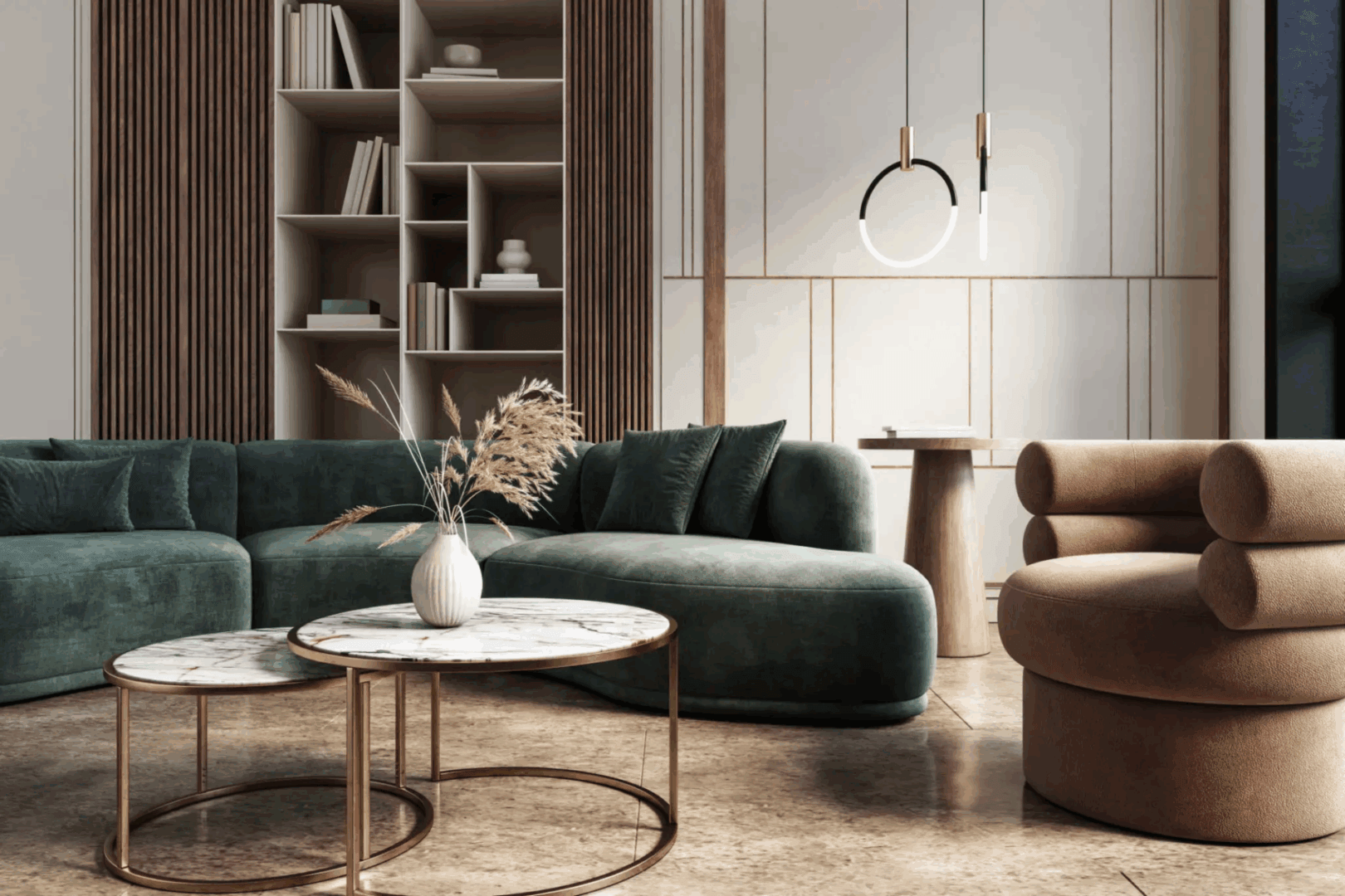 Modern living room with green velvet sofa and circular marble coffee tables.